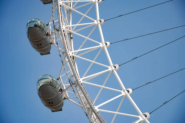 Ferris wheel against the blue sky. London, UK.