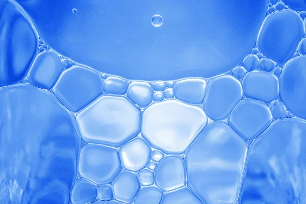 Blue mixed liquid oil water mixture