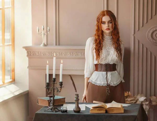 Fantasy portrait Red-haired woman in vintage dress stands in classic room. Clothing old style white blouse. Curly red hair. Redhead girl princess looks at camera beauty face lady writer fashion model.