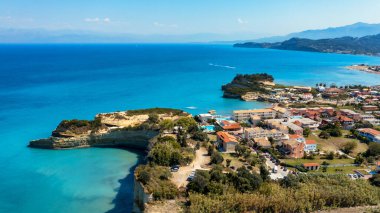 Famous Canal D'amour in Sidari, Corfu island, Greece. Famous Canal d'Amour beach with beautiful rocky coastline in amazing blue Ionian Sea in Sidari holiday village on Corfu island in Greece.