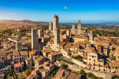 Town of San Gimignano, Tuscany, Italy with its famous medieval towers. Aerial view of the medieval village of San Gimignano, a Unesco World Heritage Site. Italy, Tuscany, Val d'Elsa.