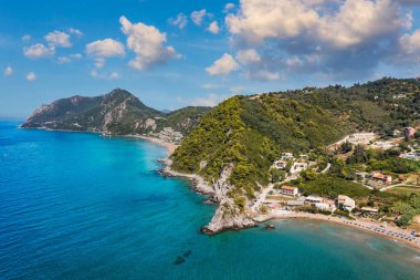 Aerial drone view over western coast and Glyfada beach, Island of Corfu, Greece. Glyfada Beach at Corfu Greece during the day. 