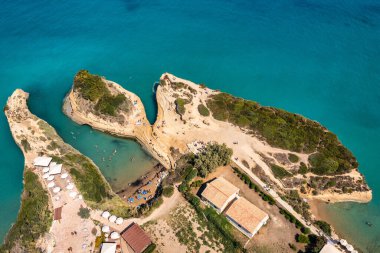 Famous Canal D'amour in Sidari, Corfu island, Greece. Famous Canal d'Amour beach with beautiful rocky coastline in amazing blue Ionian Sea in Sidari holiday village on Corfu island in Greece.