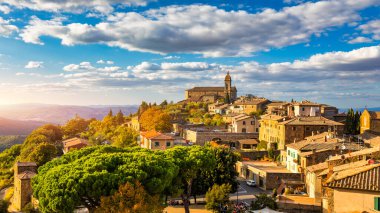 View of Montalcino town, Tuscany, Italy. Montalcino town takes its name from a variety of oak tree that once covered the terrain. View of the medieval Italian town of Montalcino. Tuscany