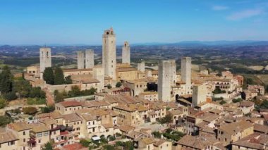 Town of San Gimignano, Tuscany, Italy with its famous medieval towers. Aerial view of the medieval village of San Gimignano, a Unesco World Heritage Site. Italy, Tuscany, Val d'Elsa.