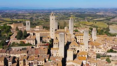 Town of San Gimignano, Tuscany, Italy with its famous medieval towers. Aerial view of the medieval village of San Gimignano, a Unesco World Heritage Site. Italy, Tuscany, Val d'Elsa.