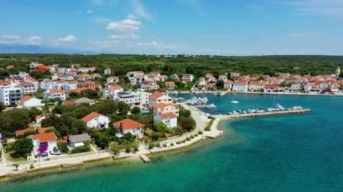 Petrcane village tourist destination coastline aerial panoramic view, Dalmatia region of Croatia. Aerial top view of village Petrcane, Croatia. Petrcane aerial view, Dalmatia region of Croatia