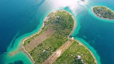 Aerial view of the heart shaped Galesnjak island on the adriatic coast, Zadar, Croatia. Heart shaped island of Galesnjak in Zadar archipelago aerial view, Dalmatia region of Croatia.