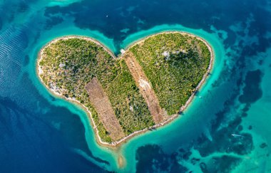 Aerial view of the heart shaped Galesnjak island on the adriatic coast, Zadar, Croatia. Heart shaped island of Galesnjak in Zadar archipelago aerial view, Dalmatia region of Croatia.
