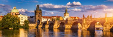 Charles Bridge in Prague in Czechia. Prague, Czech Republic. Charles Bridge (Karluv Most) and Old Town Tower. Vltava River and Charles Bridge. Concept of world travel, sightseeing and tourism. clipart