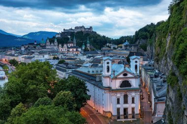 Beautiful view of the historic city of Salzburg with Festung Hohensalzburg in summer, Salzburger Land, Austria. Panoramic summer cityscape of Salzburg, Old City, birthplace of famed composer Mozart. 