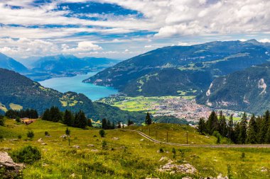 Beautiful Lake Thun and Lake Brienz view from Schynige Platte trail in Bernese Oberland, Canton of Bern, Switzerland. Popular mountain in the Swiss Alps called Schynige Platte in Switzerland. clipart
