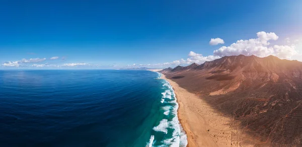 stock image Amazing Cofete beach with endless horizon. Volcanic hills in the background and Atlantic Ocean. Cofete beach, Fuerteventura, Canary Islands, Spain. Playa de Cofete, Fuerteventura, Canary Islands.