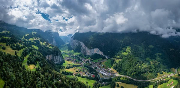 Lauterbrunnen valley with famous nature and waterfalls. Lauterbrunnen valley, Berner Oberland, Switzerland, Europe. Spectacular view of Lauterbrunnen valley in a sunny day, Switzerland.