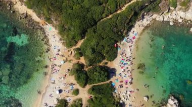 Porto Timoni is an amazing beautiful double beach in Corfu, Greece. Porto Timoni beach at Afionas is a paradise double beach with crystal clear azure water in Corfu, Ionian island, Greece, Europe
