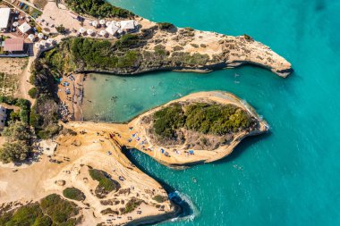 Famous Canal D'amour in Sidari, Corfu island, Greece. Famous Canal d'Amour beach with beautiful rocky coastline in amazing blue Ionian Sea in Sidari holiday village on Corfu island in Greece.