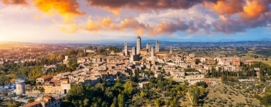 Town of San Gimignano, Tuscany, Italy with its famous medieval towers. Aerial view of the medieval village of San Gimignano, a Unesco World Heritage Site. Italy, Tuscany, Val d'Elsa.
