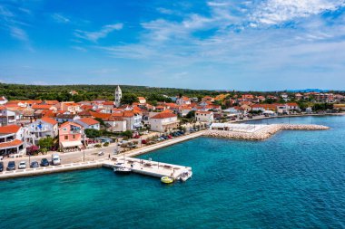 Petrcane village tourist destination coastline aerial panoramic view, Dalmatia region of Croatia. Aerial top view of village Petrcane, Croatia. Petrcane aerial view, Dalmatia region of Croatia