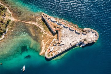 Aerial shot of St. Nicholas Fortress near Sibenik in Croatia. Old St. Nicholas fortress at Sibenik bay entrance, Dalmatia, Croatia, drone aerial shot of beautiful blue coastline seascape