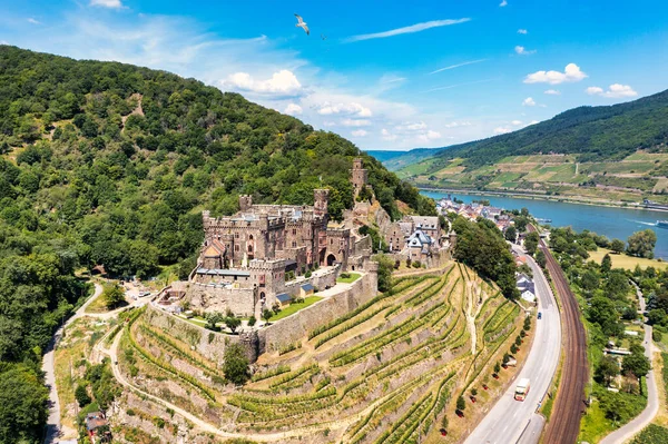 stock image Reichenstein Castle with Clemenskapelle, Trechtingshausen on the Rhine river. Middle Rhine Valley, Rhineland-Palatinate, Germany, Europe. Reichenstein castle in the valley of medieval castles.