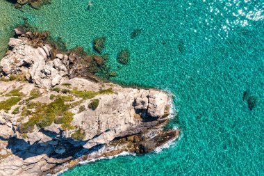 Aerial drone view over western coast and Glyfada beach, Island of Corfu, Greece. Glyfada Beach at Corfu Greece during the day. 