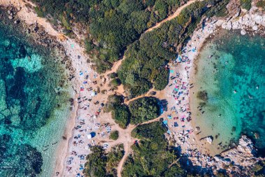 Porto Timoni is an amazing beautiful double beach in Corfu, Greece. Porto Timoni beach at Afionas is a paradise double beach with crystal clear azure water in Corfu, Ionian island, Greece, Europe