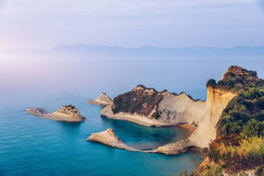 Beautiful view of Cape Drastis in the island of Corfu in Greece. Cape Drastis, the impressive formations of the ground, rocks and the blue waters panorama, Cape Drastis, Corfu, Greece, Ionian Islands.