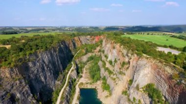 Old lime quarry, Big America (Velka Amerika) near Prague, Czech Republic. Velka Amerika (Big America, Czech Grand Canyon) is a abandoned limestone quarry near Morina village, Czech Republic.