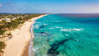 Punta Prosciutto is a wonderful beach of Salento coast, part of the Municipality of Porto Cesareo, Puglia region, South Italy. Punta Prosciutto in Apulia, one of the most beautiful beaches of Italy. clipart