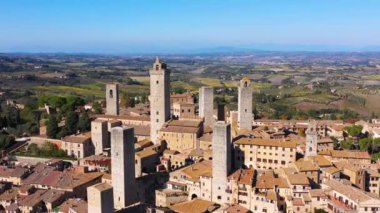 Town of San Gimignano, Tuscany, Italy with its famous medieval towers. Aerial view of the medieval village of San Gimignano, a Unesco World Heritage Site. Italy, Tuscany, Val d'Elsa.
