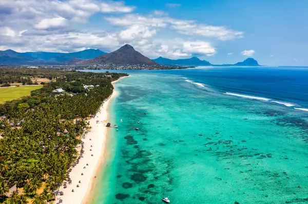 stock image Beach of Flic en Flac with beautiful peaks in the background, Mauritius. Beautiful Mauritius Island with gorgeous beach Flic en Flac, aerial view from drone. Flic en Flac Beach, Mauritius Island.
