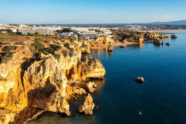 stock image Panoramic view, Ponta da Piedade near Lagos in Algarve, Portugal. Cliff rocks and tourist boat on sea at Ponta da Piedade, Algarve region, Portugal. Ponta da Piedade, Algarve region, Portugal.