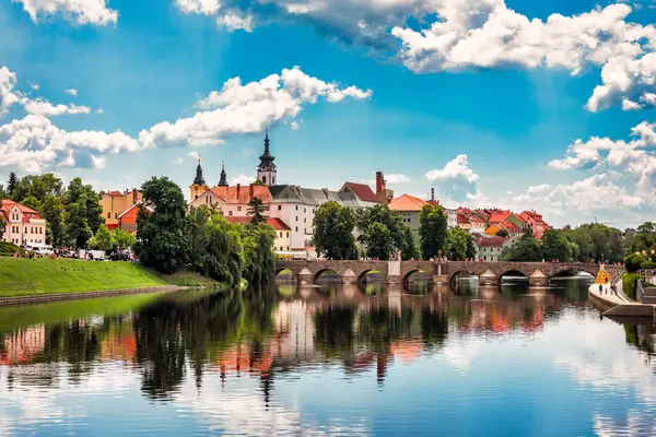 stock image Medieval Town Pisek and historic stone bridge over river Otava in the Southern Bohemia, Czech Republic. Pisek Stone Bridge, the oldest preserved early Gothic bridge in the Czech republic.