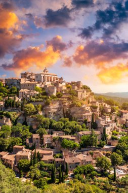 View on Gordes, a small typical town in Provence, France. Discover the stunning hilltop village of Gordes in Provence. Ancient hilltop village of Gordes, Provence, France. clipart