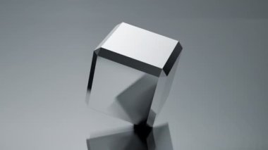 Sıvı bir yüzey üzerinde ekseninde tahmin edilemeyen bir şekilde hareket eden 3 boyutlu küp dalgalanmalar yaratıyor. 4k Döngü.