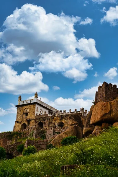 Vertical Low Angle Golconda Fort Ruins Grass Cloudy Sky Background — Stock Photo, Image
