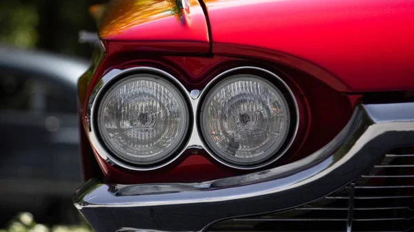 Closeup Red Ford Thunderbird Car Silver Headlights Blurred Background — Stock Photo, Image