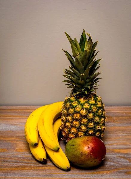 Vertical Shot Mango Pineapple Bananas Wooden Surface — Stock Photo, Image