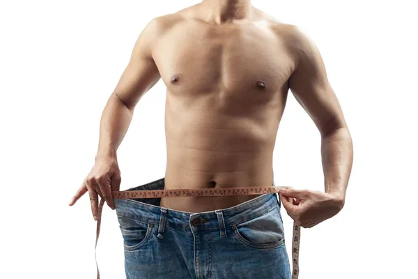 Das Konzept Der Gewichtsabnahme Ein Muskulöser Mann Ohne Hemd Der — Stockfoto