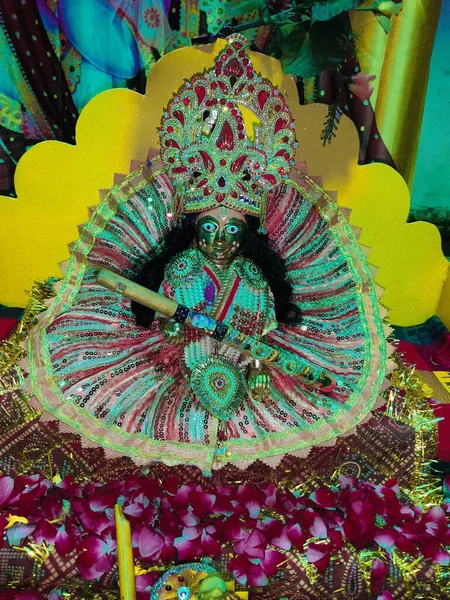 Closeup Shot Idol Laddu Gopal Sitting Colorful Dress Holding Flute — Stock Photo, Image