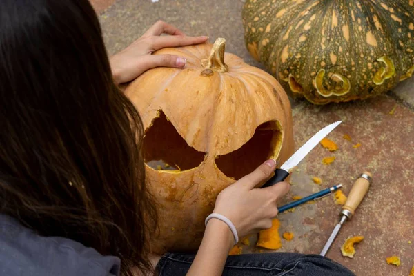 Closeup Shot Person Carving Orange Pumpkin Halloween — Stock Photo, Image