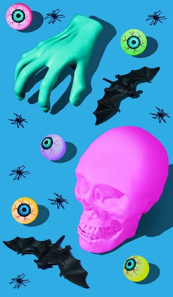用粉色骷髅 僵尸手 蝙蝠和蓝色背景的眼球进行万圣节恐怖概念的3D渲染 — 图库照片