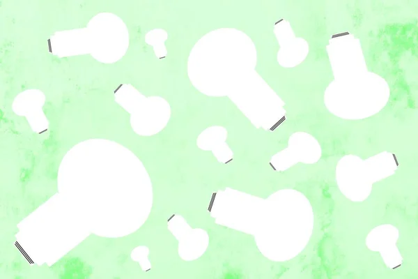 Yeşil Arka Planda Çeşitli Boyutlarda Ampullerin Deseni — Stok fotoğraf
