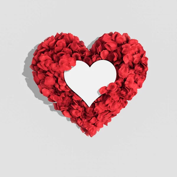 Ein Rotes Herz Aus Blütenblättern Auf Weißem Hintergrund Mit Einem — Stockfoto