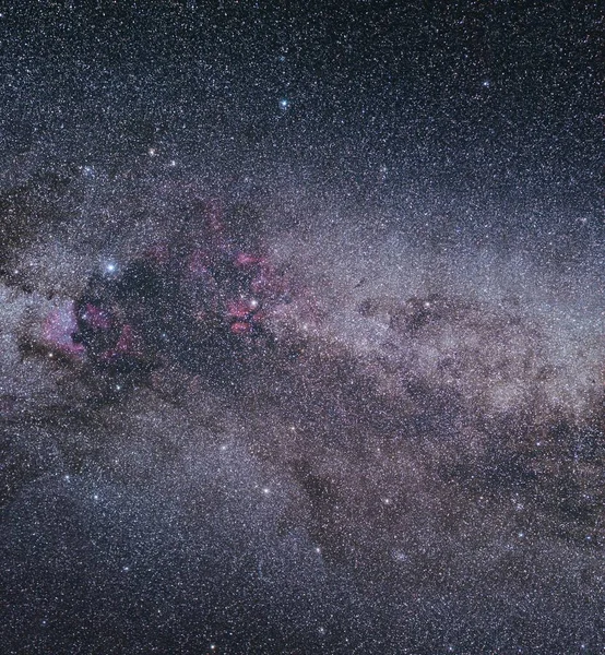 A beautiful starry galaxy night sky with the swan cygnus constellation