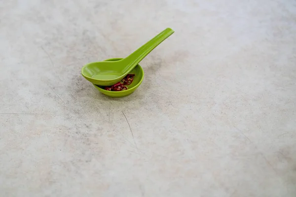 Closeup Shot Small Plate Cute Red Chilies Spoon — Stock Photo, Image