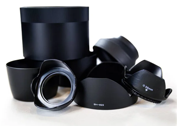 Een Close Shot Van Zwart Geassorteerde Lensafzuigkappen Voor Professionele Camera — Stockfoto