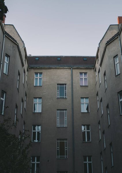 A vertical shot of modern buildings on a sunny day