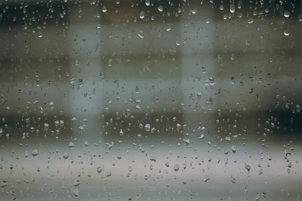 有雨滴的窗户的背景 — 图库照片