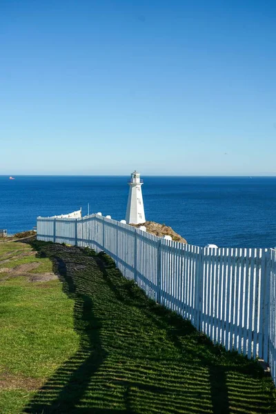 Old Lighthouse Background Pristine White Picket Fence Foreground Found John — Stock Photo, Image